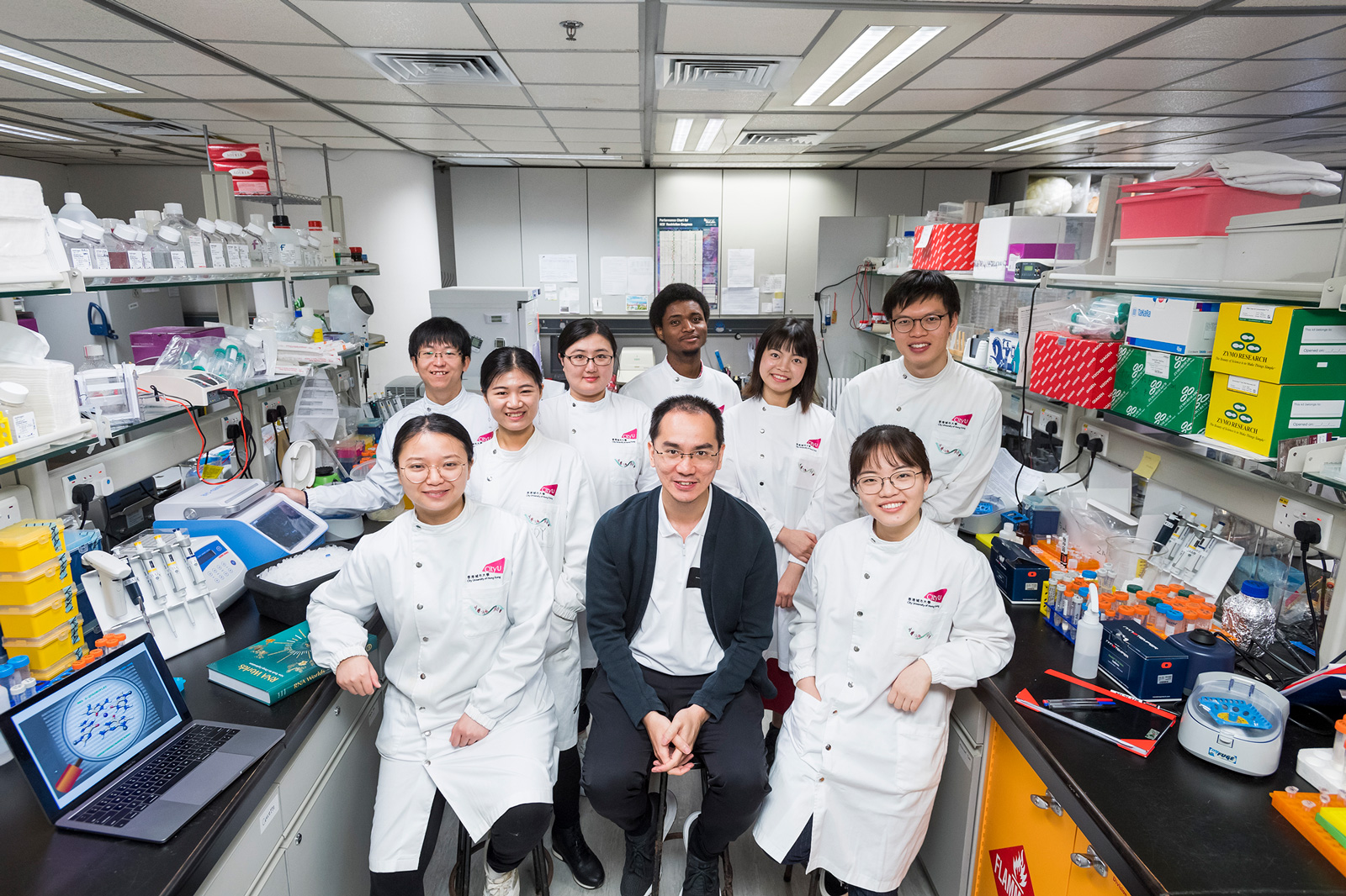 Dr Kwok Chun-kit (middle in front row) and his research team.
