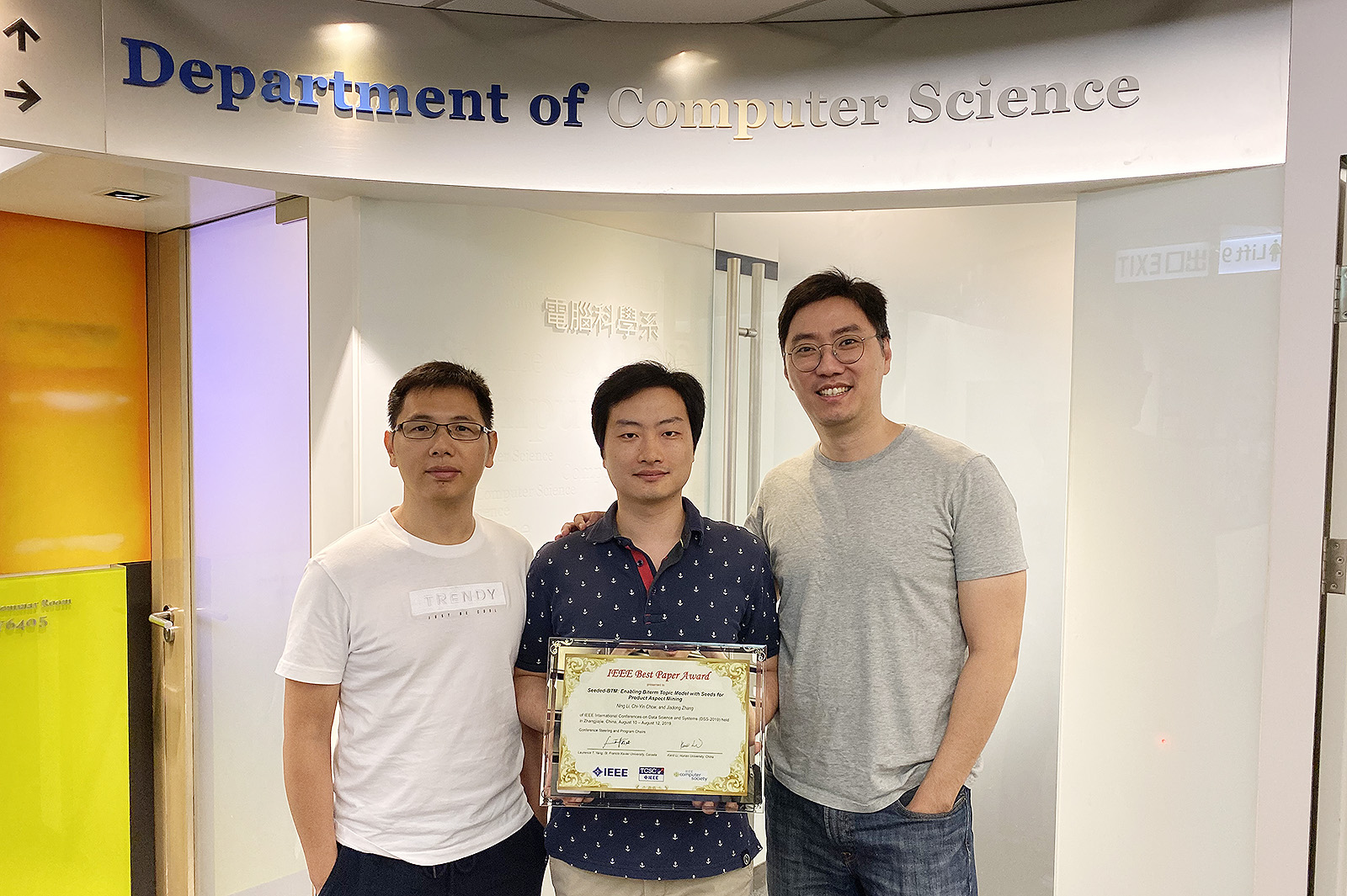 (From left) Dr Zhang Jiadong, Mr Li Ning and Dr Ted Chow with the Best Paper Award from IEEE’s International Conference on Data Science and systems.