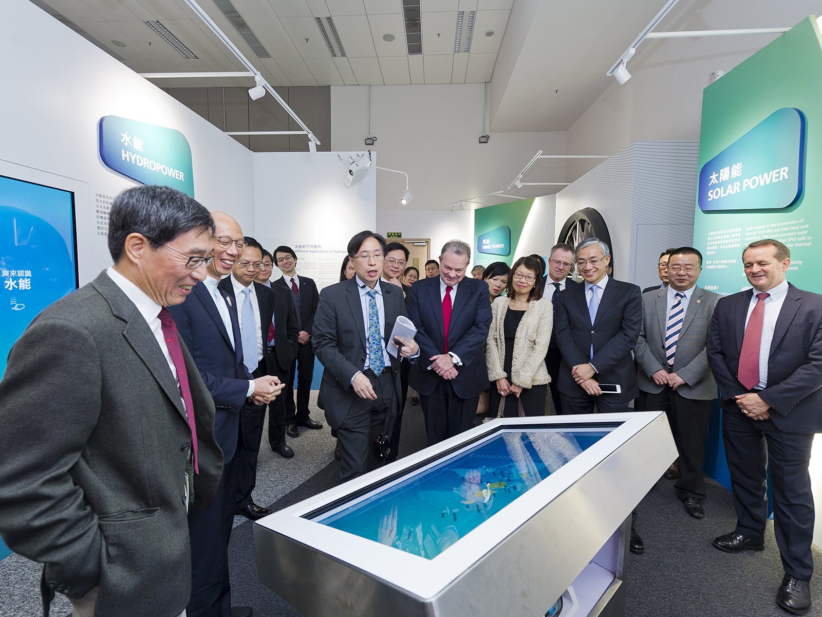 The guests visit the Low Carbon Energy Education Centre and are impressed by the interactive exhibits.