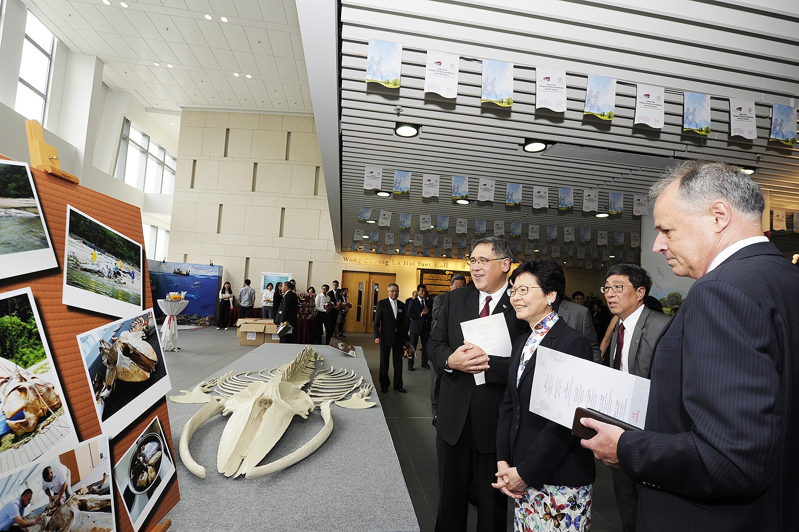 Mrs Carrie Lam (2nd on left) views an exhibition during the naming ceremony for the Jockey Club College of Veterinary Medicine and Life Sciences.