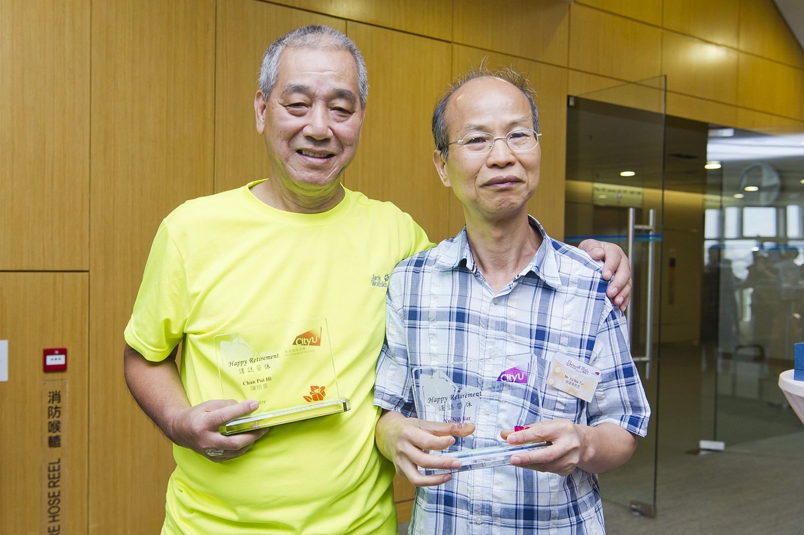 Mr Chan (left) and Mr Yu (right) have both witnessed how CityU has changed over the years.